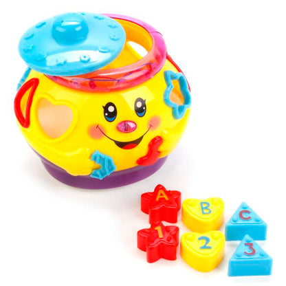 ИГРУШКА ОБУЧАЮЩАЯ "УМКА" "МУЗЫКАЛЬНЫЙ ГОРШОЧЕК" СВЕТ+ЗВУК 2056C В РУСС. КОР. 17*15*15СМ в кор.2*24шт