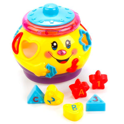ИГРУШКА ОБУЧАЮЩАЯ "УМКА" "МУЗЫКАЛЬНЫЙ ГОРШОЧЕК" СВЕТ+ЗВУК 2056C В РУСС. КОР. 17*15*15СМ в кор.2*24шт