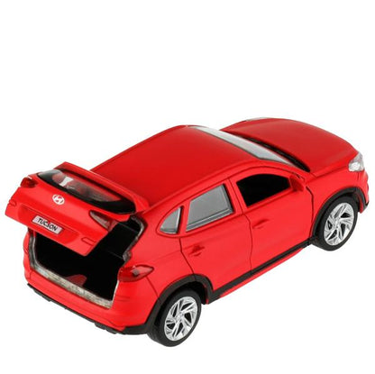 TUCSON-12FIL-RD336378 Машина металл HYUNDAI TUCSON длина 12 см, двери, багаж., инер, красный, кор. Т