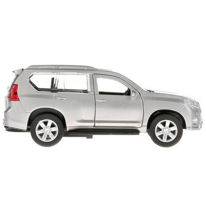 Machine en métal "TOYOTA PRADO" 12 cm, ouverte. двери, инерц, СЕРЕБРИСТЫЙ в кор. Parc technologique dans le cor.2*36шт