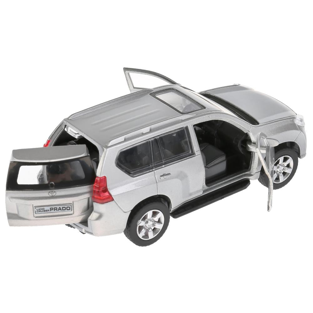 Machine en métal "TOYOTA PRADO" 12 cm, ouverte. двери, инерц, СЕРЕБРИСТЫЙ в кор. Parc technologique dans le cor.2*36шт