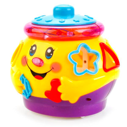 ИГРУШКА ОБУЧАЮЩАЯ "УМКА" "МУЗЫКАЛЬНЫЙ ГОРШОЧЕК" СВЕТ+ЗВУК 2056C В РУСС. КОР. 17*15*15СМ в кор.2*24шт